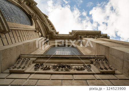 An angled perspective of St. Paul s Cathedral highlights its sculpted facade and elegant curved stonework. An angled perspective of St. Paul s Cathedral highlights its sculpted facade and elegant curved stonework. 124523900