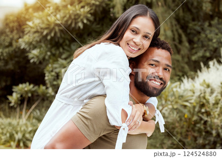 Love, back and couple in nature for a happy, content and peaceful summer romance on a honeymoon holiday vacation. Smile, relaxed and romantic woman hugging partner with freedom in a natural park 124524880