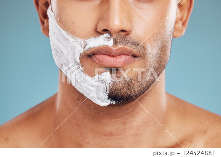 Face, shaving and beauty cream man closeup of beard facial, wellness and grooming product advertising. Cosmetic, skincare and shave foam hygiene routine of male model with teal studio background. 124524881