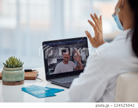 Video call, healthcare and doctor consulting with a man on a laptop for health, help and advice at a hospital. Medical, consultation and patient with wave while doing telehealth with a nurse on tech 124525042