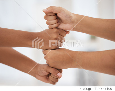 Fist bump, hands and team building for a mission, collaboration and business partnership goals with our vision. Teamwork, support and employees with commitment, motivation and handshake in a meeting 124525100