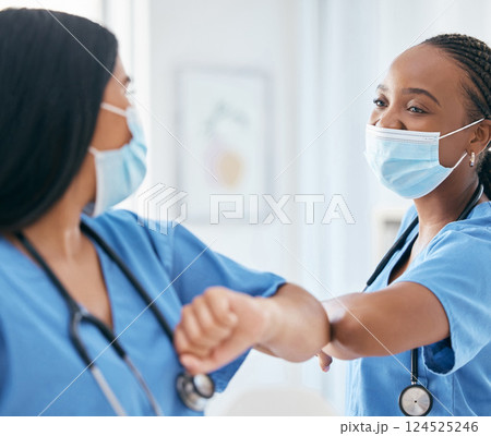 Elbow greeting, covid nurses and meeting in hospital, clinic and surgery for wellness, medical trust and support. Happy nursing staff employees, face mask and body contact for social distance safety 124525246