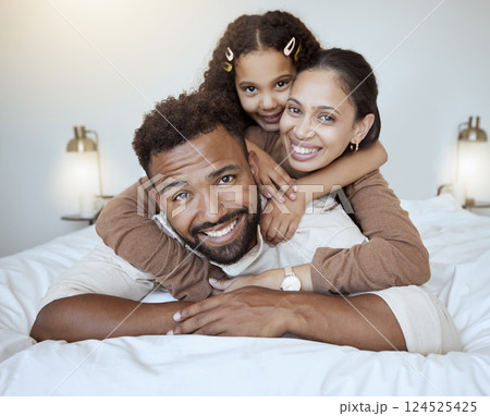 Bed, happy family and girl in bedroom, happy and smile while bond, hug and having fun together. Love, portrait and black family of mother, dad and daughter rest, play and enjoy quality time in home 124525425
