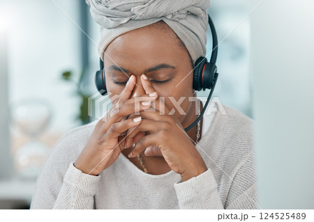 Black woman stress, call center consultant in office closeup while working at customer support hotline. Customer service woman, anxiety burnout with mental health and work depression in crm workplace Black woman stress, call center consultant in office closeup while working at customer support hotline. Customer service woman, anxiety burnout with mental health and work depression in crm workplace 124525489