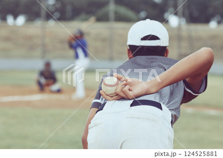 Baseball, pitcher and ball in hand, player ready to pitch and young men playing on field. Sports, fitness and professional baseball player in uniform with baseball bat waiting on diamond to win game. Baseball, pitcher and ball in hand, player ready to pitch and young men playing on field. Sports, fitness and professional baseball player in uniform with baseball bat waiting on diamond to win game. 124525881