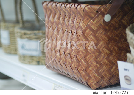 Handcrafted woven baskets displayed in a local craft shop Handcrafted woven baskets displayed in a local craft shop 124527253