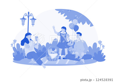 A family enjoys a morning picnic in the park. 124528391