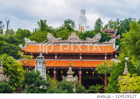 Asian Buddhist Temple and Buddha statue at Long Son Pagoda in Nha Trang in Vietnam Asian Buddhist Temple and Buddha statue at Long Son Pagoda in Nha Trang in Vietnam 124529127