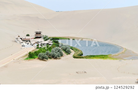 Photo of the famous Crescent Spring scenic spot in the desert of Dunhuang, Gansu Province, China Photo of the famous Crescent Spring scenic spot in the desert of Dunhuang, Gansu Province, China 124529292