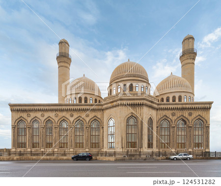 Bibi-Heybat Mosque in Baku, Azerbaijan, with its iconic minaret and intricate facade, glows in the sunset 124531282