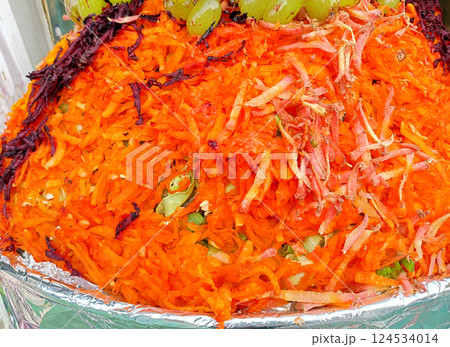 Stall for street food serving grated vegetables Stall for street food serving grated vegetables 124534014
