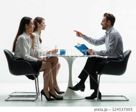 Business meeting discussion concept with professionals in modern office setting 124537805