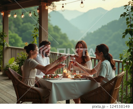 Summer evening reunion: friends dining on scenic mountain terrace Summer evening reunion: friends dining on scenic mountain terrace 124538149