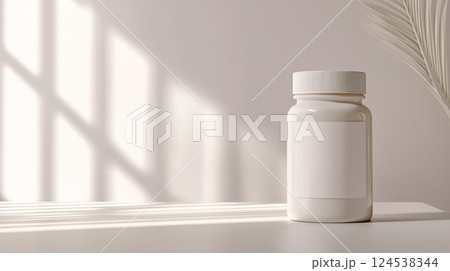 Minimalist White Bottle for Dietary Supplements with blank label on Table with Shadow Design. Concept of Health Products, Minimalism, Supplement Packaging, Wellness. Mockup. Copy space 124538344