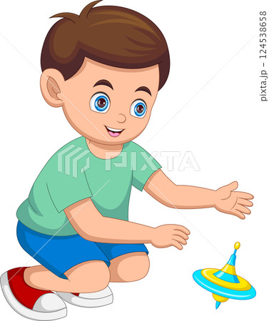 little boy playing with spinning top toy 124538658