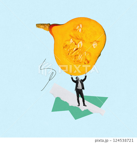 Man holding up giant pumpkin slice against light blue background. Conceptual art collage. 124538721