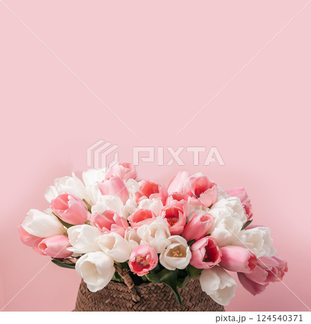 greeting card for spring holiday Happy mothers day composition. Beautiful background of bouquet of pink and white tulips. perfect for romantic themes, wedding invitations, and feminine branding. 124540371