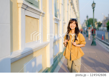 Traveler asian woman in her 30s enjoying travel in Bangkok, Thailand. Journey trip lifestyle, world travel explorer or Asia summer tourism concept. 124542606