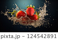 Fresh Strawberries Dive into Water, Creating a Colorful Splash 124542891