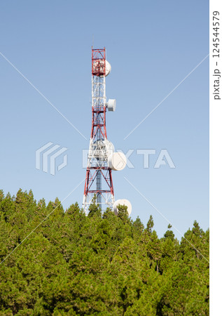 Atenna for telecommunications over a forest. Atenna for telecommunications over a forest. 124544579