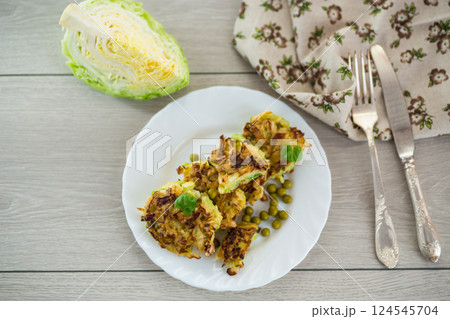 vegetable cutlets from early cabbage with peas 124545704