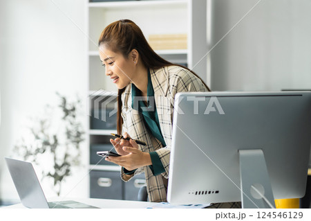 online shopping concept, woman shopping online is a form of electronic commerce from a seller over internet. 124546129