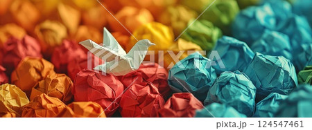 Origami Dove Symbolizing Peace and Opportunities Among Colorful Crumpled Paper Balls, Dare to be different, Freedom concept 124547461