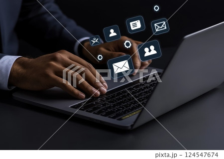 Businessperson in Motion Creating Dynamic Digital Effects over Laptop with Motion Blur 124547674
