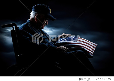 Dramatic Portrait of an Elderly Veteran in a Wheelchair with High Contrast Lighting Dramatic Portrait of an Elderly Veteran in a Wheelchair with High Contrast Lighting 124547879