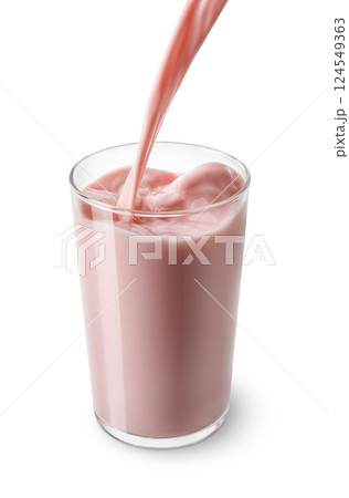 strawberry milk pouring into glass isolated on white background strawberry milk pouring into glass isolated on white background 124549363