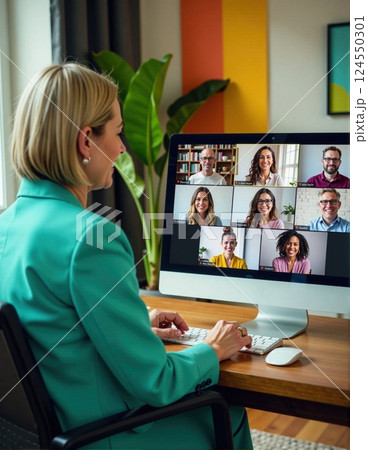 Young caucasian female participating in business video conference with diverse colleagues 124550301