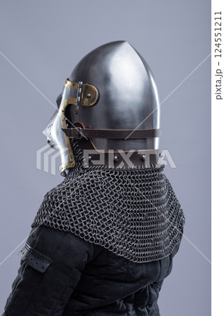 Side View of a Medieval Bascinet Helmet with Hounskull Visor 124551211