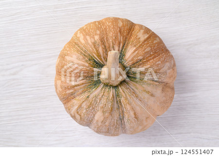 Organic Asian pumpkin on white background, Top view 124551407