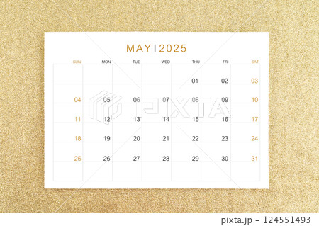 May 2025 page on gold glitter background. 124551493