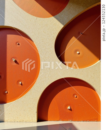 Abstract geometric design with textured orange circles and shadows for modern interior art Abstract geometric design with textured orange circles and shadows for modern interior art 124552130