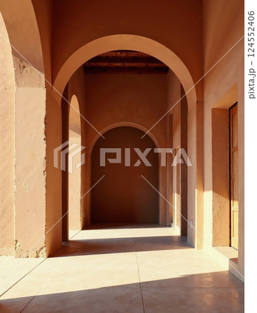 Sunlit mediterranean archway corridor with warm tones and shadows 124552406