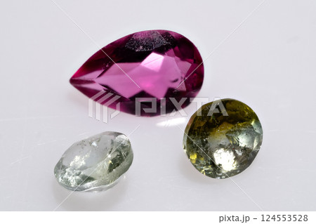 Close-Up of Polished Multicolored Tourmaline Gemstones in Pear and Oval Shapes Close-Up of Polished Multicolored Tourmaline Gemstones in Pear and Oval Shapes 124553528