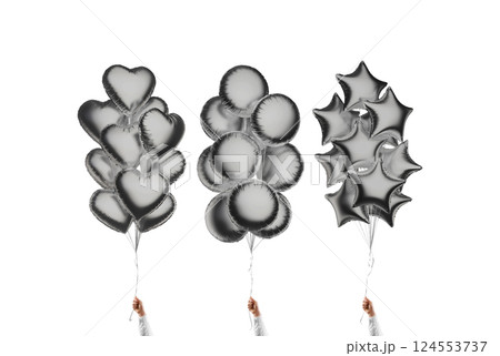 Hand holding black star, round, heart balloon bouquet mockup, isolated 124553737