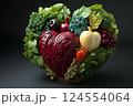 Heart shape made of fresh vegetables on dark background. Healthy food concept. top view 124554064