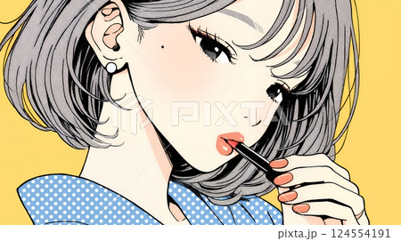 化粧をしている（口紅をつけている）若い女性