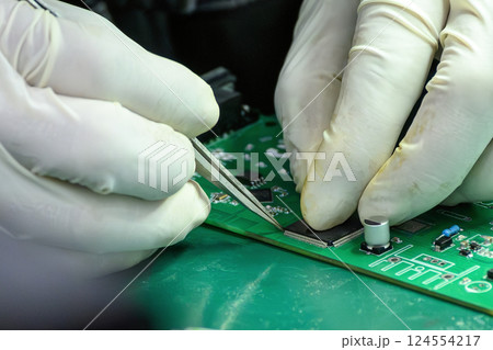 Close up scene the soldering operation by skill operator. Close up scene the soldering operation by skill operator. 124554217