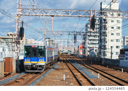 Nankai Main Line train on railway from Wakayama to Osaka 124554465