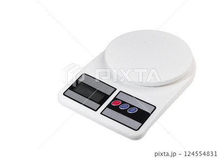 White kitchen scales for weighing products. Home appliances. 124554831