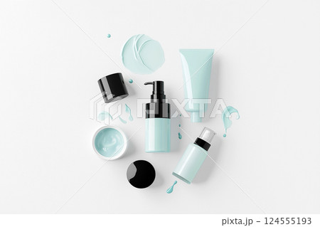 Assorted cosmetic containers on white background with product and packaging variety. A flat lay of various cosmetics and textures on a clean background. Men's cosmetics 124555193