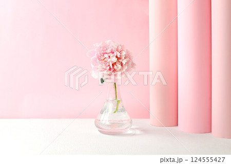 Abstract beautiful flower arrangement. Empty product podium and fresh peonies, elegant beauty concept,Stage for product display and business concept. Minimal modern aesthetic. selective focus. 124555427