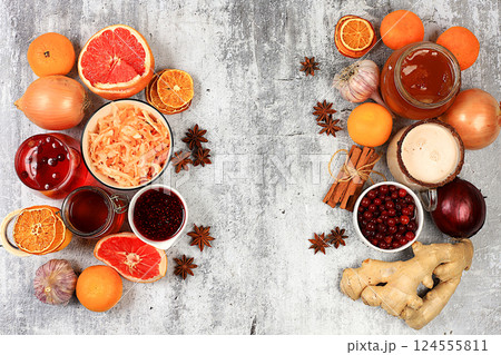 Fresh fruits, vegetables, spices and natural ingredients to strengthen the immune system. Healthy natural products with vitamin C to treat flu and colds. Organic virus protection, selective focus. Fresh fruits, vegetables, spices and natural ingredients to strengthen the immune system. Healthy natural products with vitamin C to treat flu and colds. Organic virus protection, selective focus. 124555811