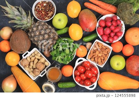 Healthy balanced food with diet ingredients, vegetables, fruits, nuts for weight loss, healthy lifestyle concept. Organic anti-virus products, selective focus 124555898