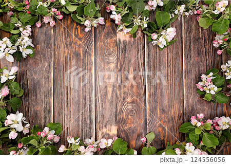 Spring flower arrangement, still life with blossoming apple tree branches on wooden background with space for text.Holiday card and spring greeting,screen banner,nature background Spring flower arrangement, still life with blossoming apple tree branches on wooden background with space for text.Holiday card and spring greeting,screen banner,nature background 124556056