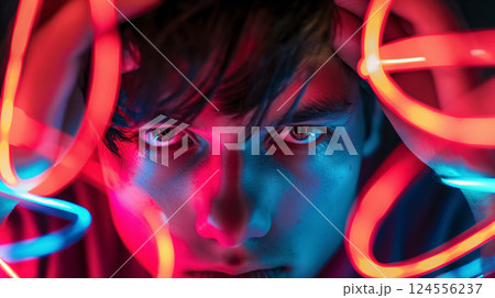 Man's face with vibrant neon light loops. Man's face with vibrant neon light loops. 124556237