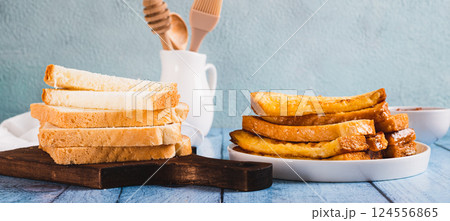 French crispy sweet toast on plate on table web banner 124556865
